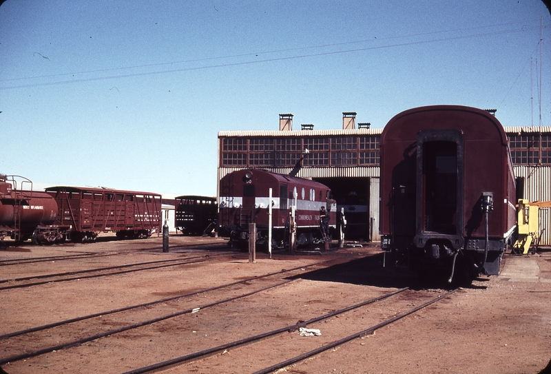 106198: Alice Springs NSU 60 and Standard Gauge Profile Carriage outside Locomotive Depot and Workshops