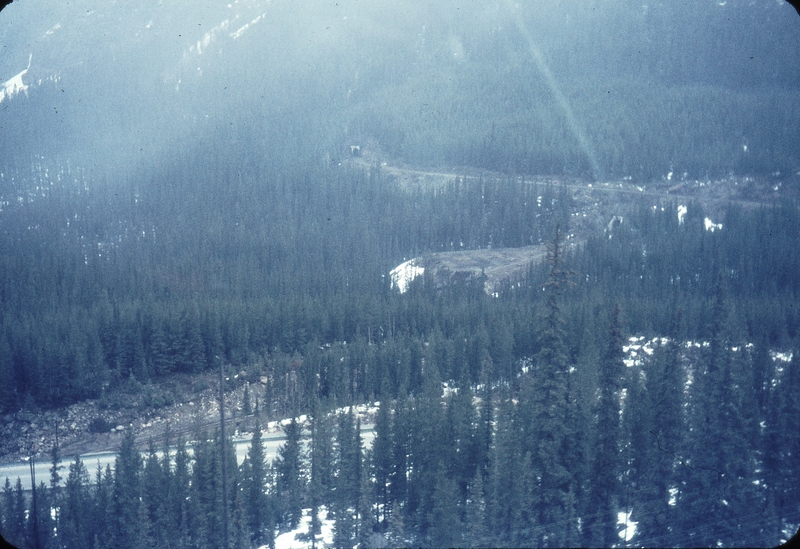 110194: View of Lower Spiral Tunnel from No 2 Canadian on upper level near Mile 132 Laggan Sub. BC
