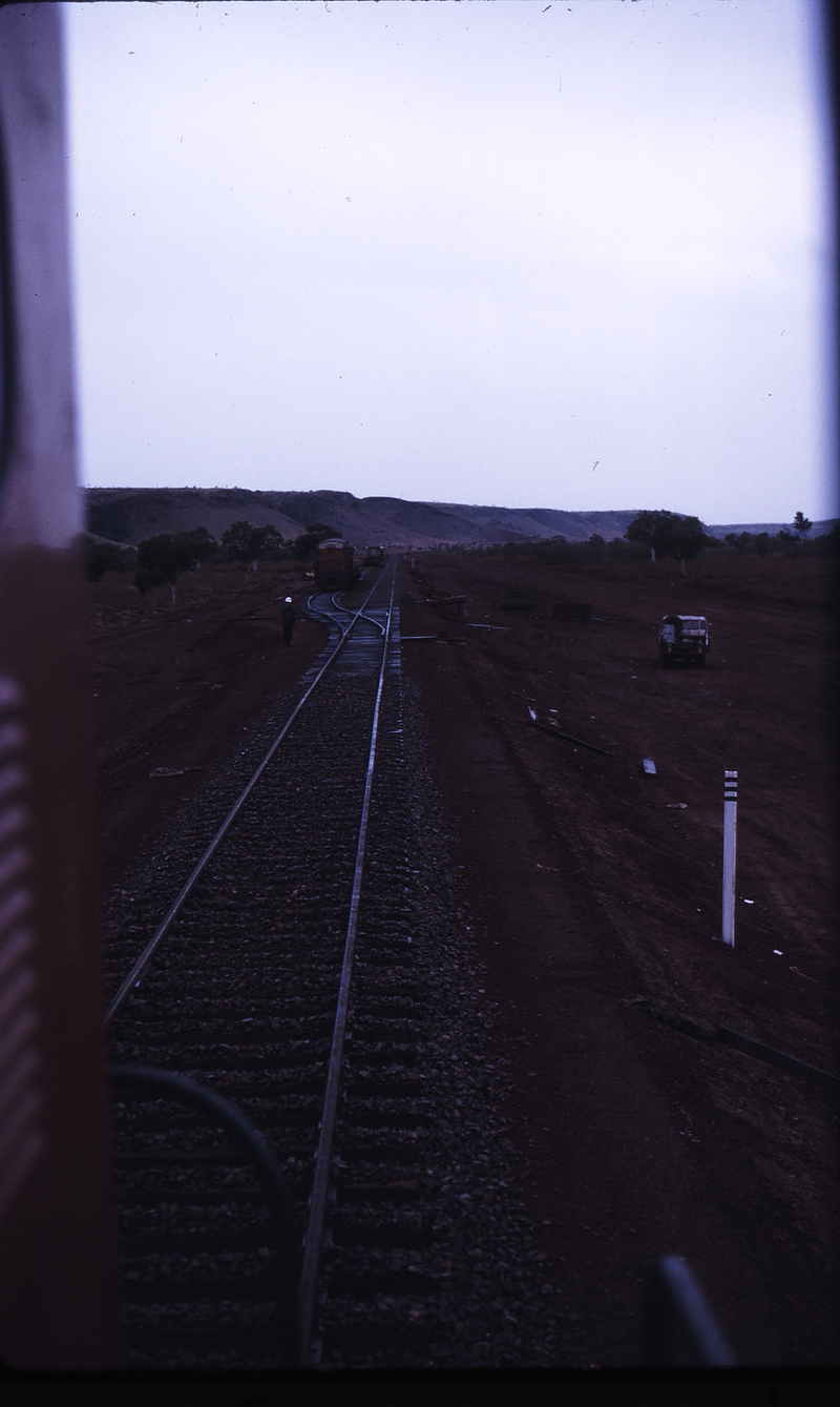 112004: Goldsworthy Railway Shay Gap Extension Mile 108.75 View East from No 5 on ballast train Steel Train No 1 in siding