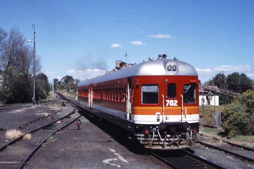 117057: Richmond Up Rail Motor 702 trailing