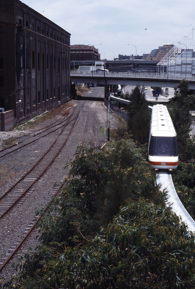 117973: Sydney TNT Monorail Train approaching Haymarket Station Also SRA Tracks at Darling Harbour