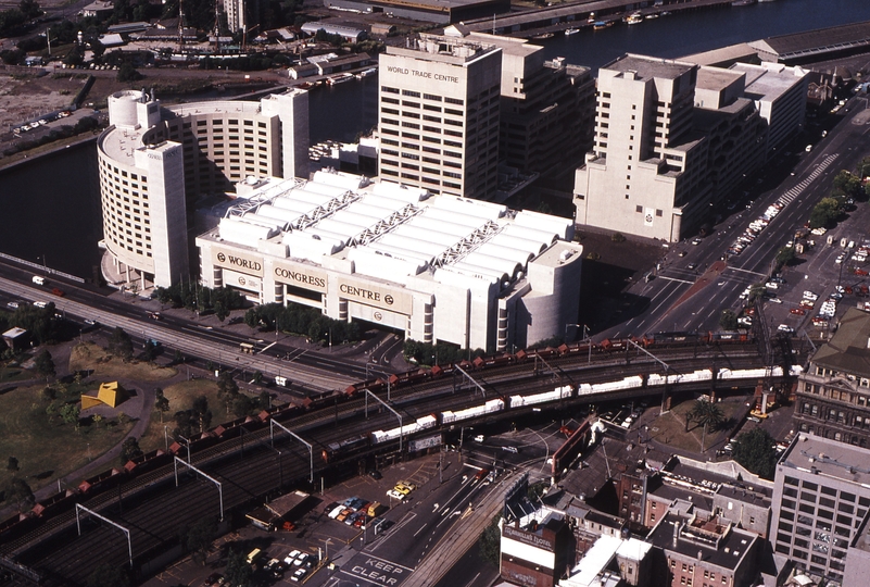 118779: Flinders Street Viaduct at Spencer Street Viewed from Level 44 The Rialto Quarry Train to Kilmore East and 9559 Goods to APM Fairfield