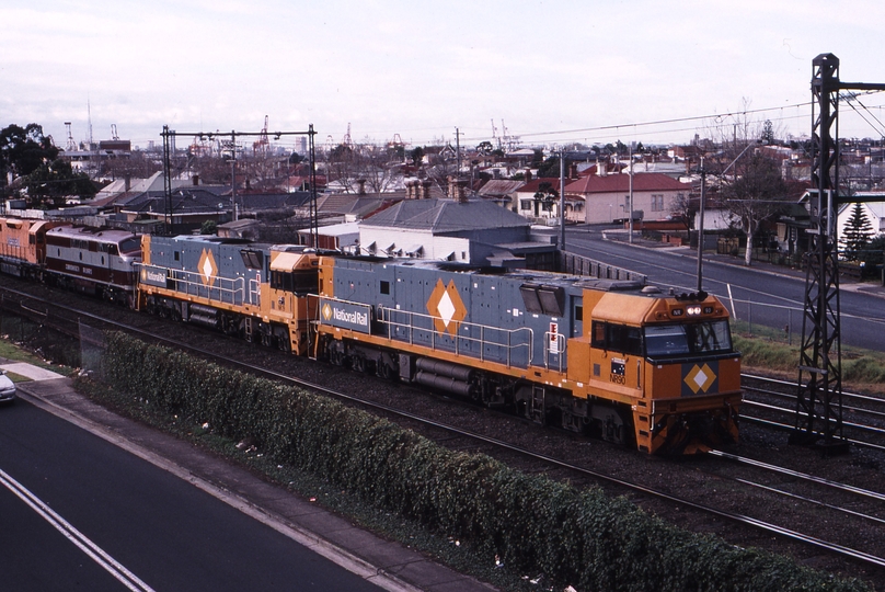122490: West Footscray Junction 9822 Adelaide Steel Train NR90 NR 19 towing GM 1 L 262 Q 319