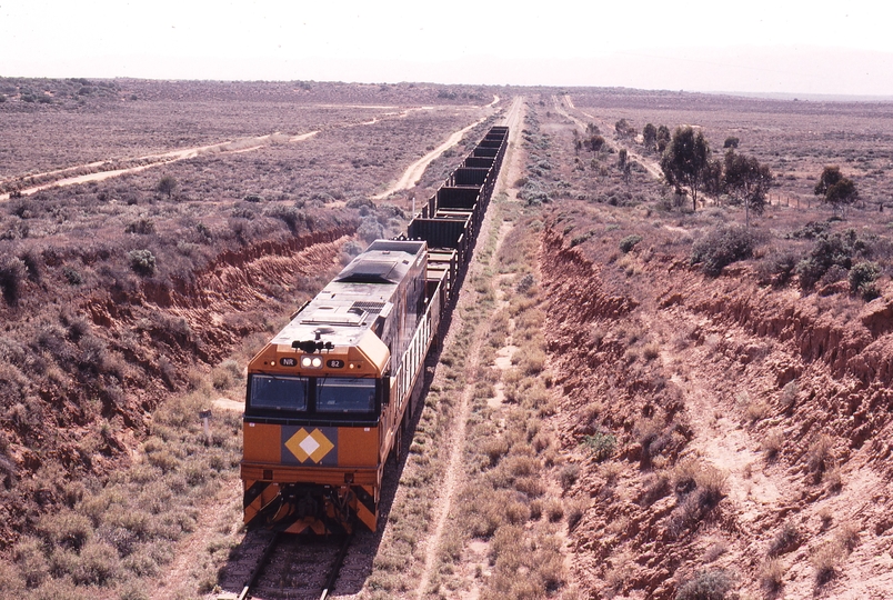 122818: Whyalla Line km 99 Southbound Steel Empty NR 82