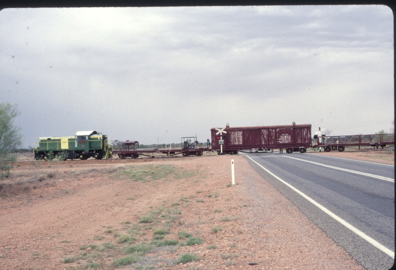 124179: Stuart Highway Level Crossing km 1292 5 Narrow Gauge Central Australia 10:00am Southbound Passenger DH 14