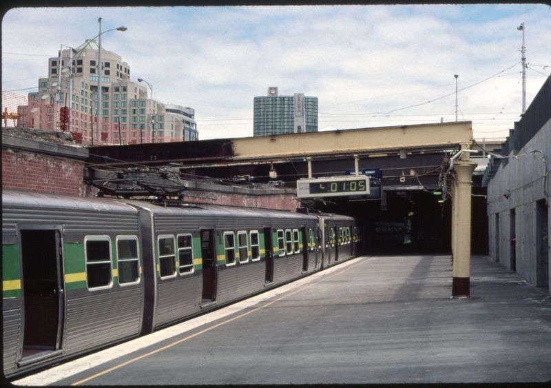 124286: Flinders Street Platform 13 Sandringham Train at platform 6 car Hitachi