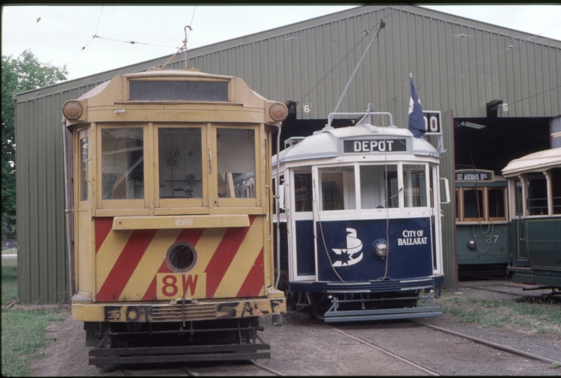 124489: Ballarat Tramway Museum Melbourne Track Cleaner 8W W4 671 in background No 27