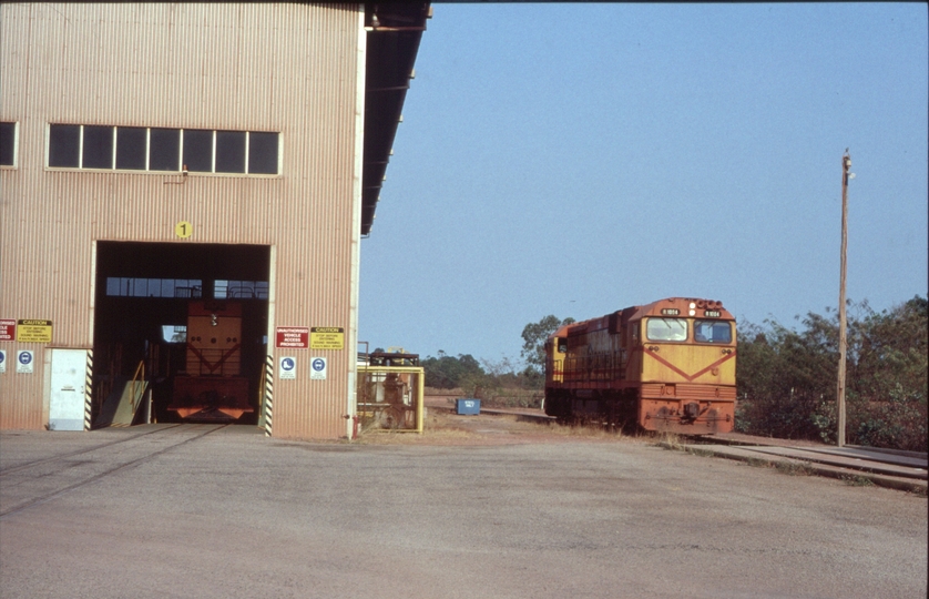 126916: Weipa Locomotive Depot and Workshop R 1001 in shed and R 1004