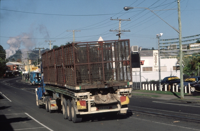 127145: Nambour Mill Howard Street East end Road vehicle carrying empty cane bins