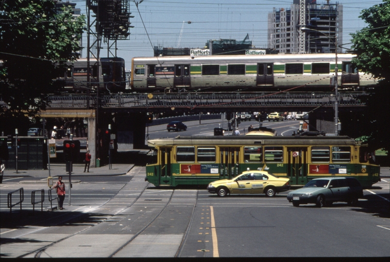 127184: Flinders Street Viaduct at Queensbridge Tram in Flinders Street A1 242 and 695 M nearest on Connex Comeng Suburban Train