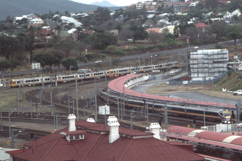 127715: Roma Street Stabled Tilt Train and Suburban Train on Triangle to Normanby viewed from 'Holiday Inn'