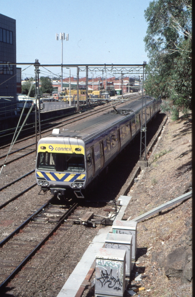 128442: Burnley (up side), Coppin Street Over Bridge 599 M leading Up Suburban 3-car Connex Comeng