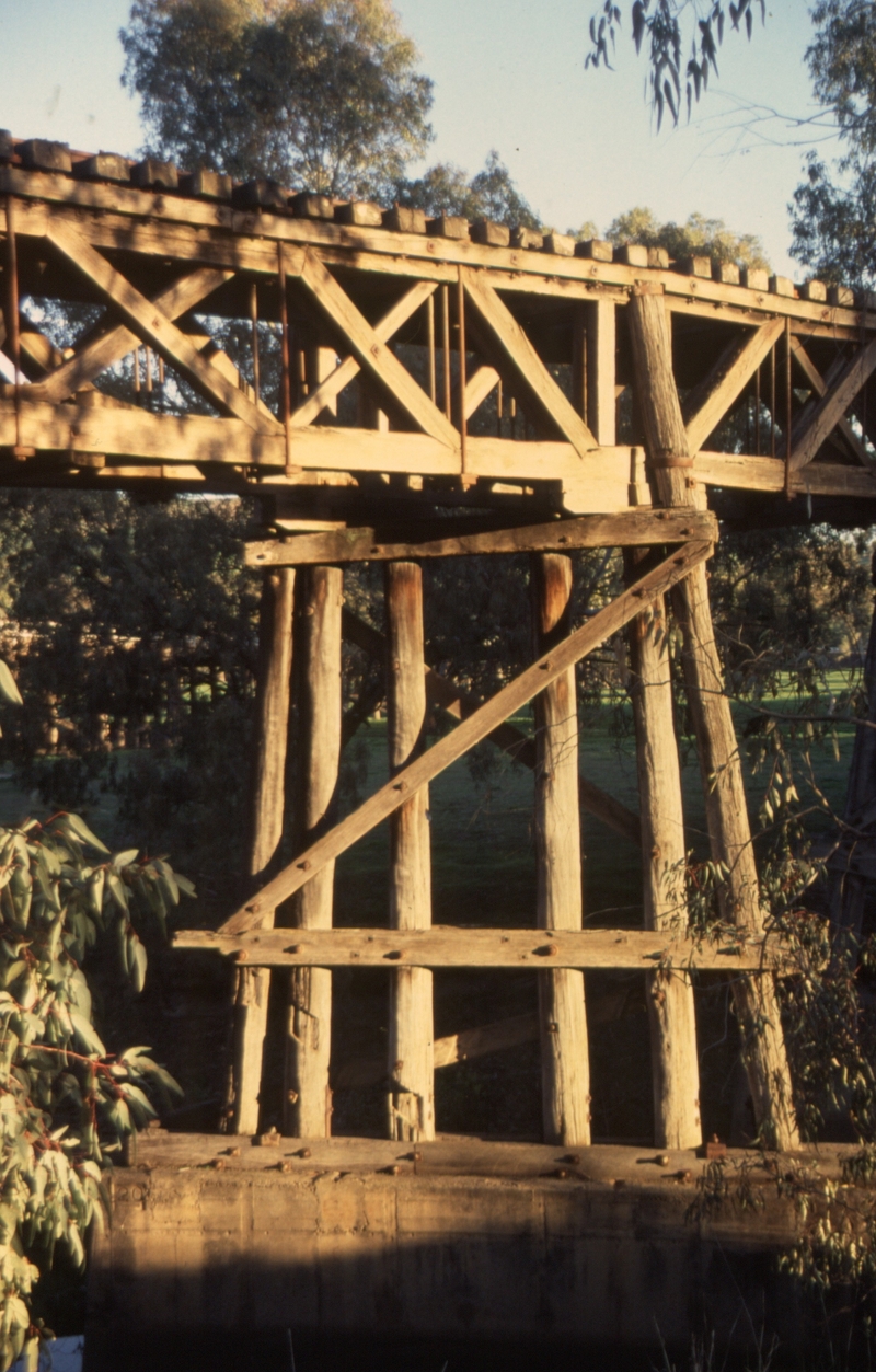 132176: Gindagai Murrumbidgee River Bridge Timber bent and Howe Trusses at station end