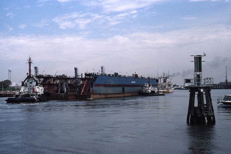 400637: Yarra River opposite Victoria Dock A J Wagglen being towed off to China (later lost at sea), Photo Michael Venn