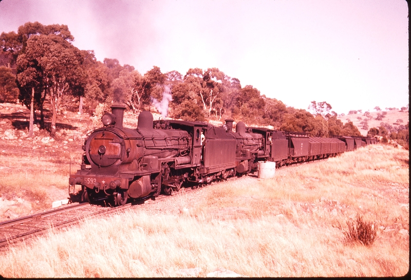 100307: Bethungra Spiral Up Goods 5594 5597 Approaching over tunnel