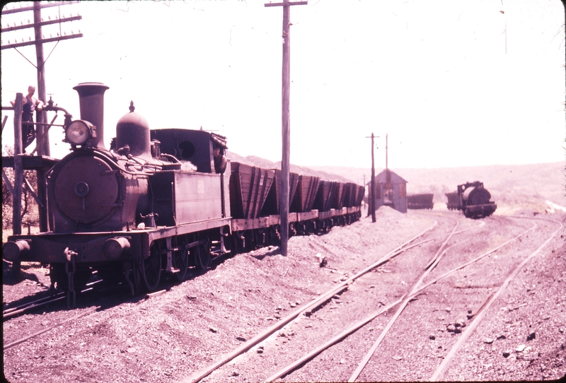 101116: Catherine Hill Bay Exchange Sidings Loaded Coal Train 1801 background No 27