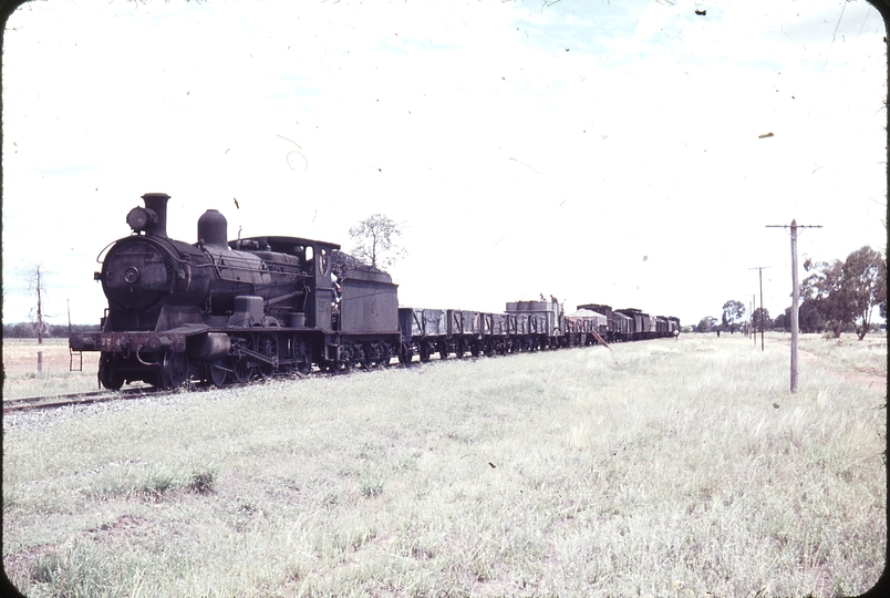 102332: Mile 324.75 Peak Hill Line Down Goods 3374 Discharging sleepers