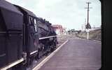 103346: Pukekohe Up Relief Express Ja 1283 Background down 88 seat railcar