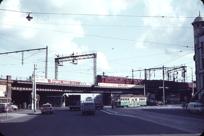 104826: Flinders Street at Spencer Street W2 582 and Tait Suburban Train on Viaduct