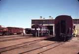 106198: Alice Springs NSU 60 and Standard Gauge Profile Carriage outside Locomotive Depot and Workshops