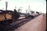 106825: Doodlakine down side Work Train and Straddle Crane at End of Steel on Standard Gauge Line Looking East