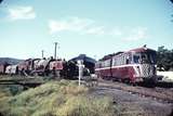 108197: Mount Morgan Up Goods Beyer Garratt 1006 and Up Rail Motor RMd 91 leading