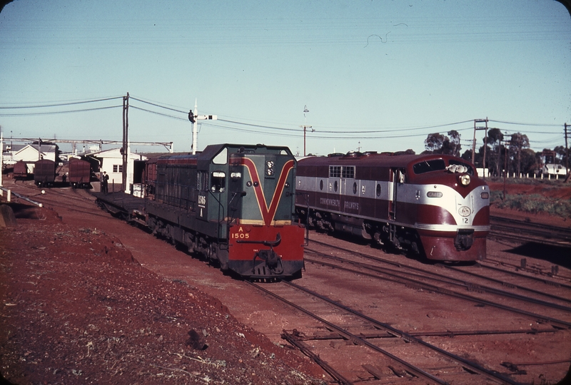 108849: Kalgoorlie WAGR Shunter A 1505 and Eastbound Trans Australia Express GM 12