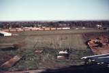 109547: Mile 4 South Maida Vale Down Wheat Empty L 2xx On original Main line viewed from roof of Forrestfield Locomotive Depot