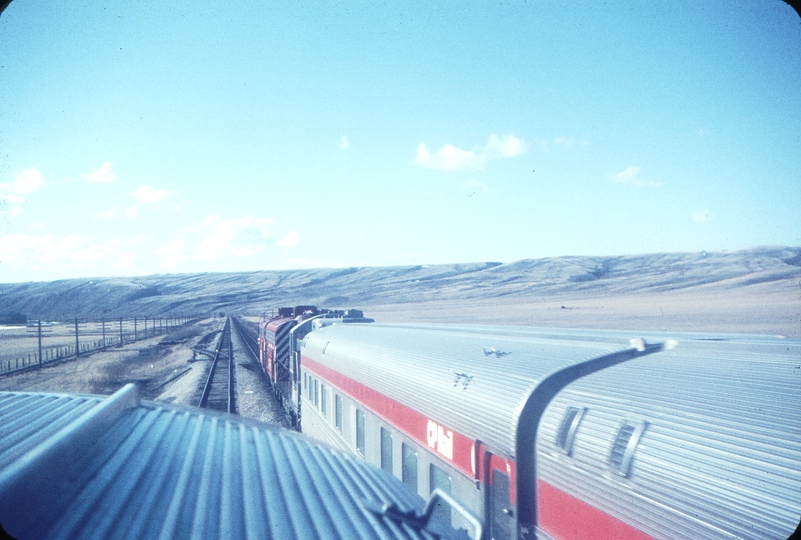 110200: Bearspaw AB No 1 Canadian 1410 leading taken from Observation Car of No 2 Canadian