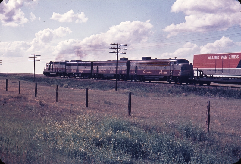 110243: Mile 11.6 Brooks Sub. Near Redcliffe AB Westbound Freight 5009 4408 4444 4029