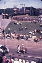 110251: Mile 0.2 Brooks Sub Medicine Hat AB No 1 Canadian with Medicine Hat Stampede Parade passing under bridge