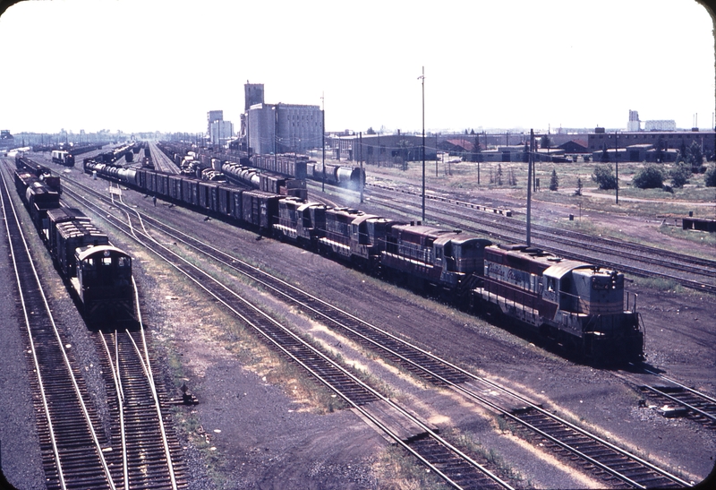 110845: Alyth AB Southbound Freight to Lethbridge 8624 8549 8649 8689 and at left 6718