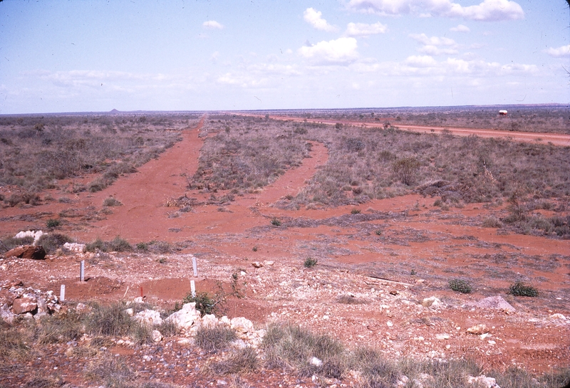 111811: Goldsworthy Railway Shay Gap Extension Mile 72.9 Looking East HV Transmission Line Base in foreground