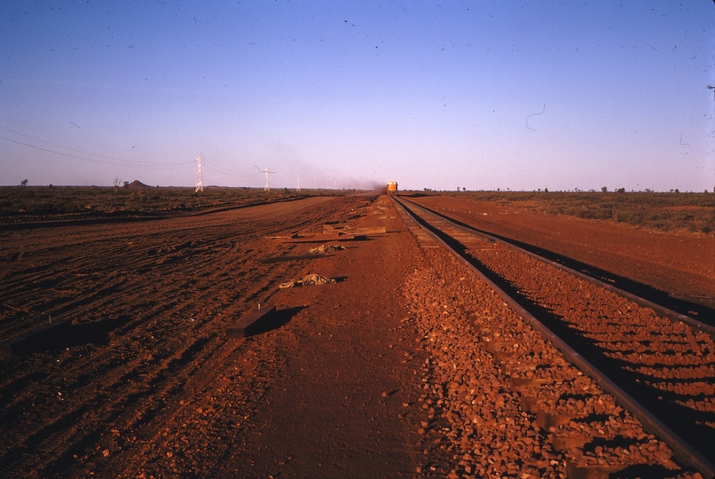 111877: Goldsworthy Railway Shay Gap Extension Mile 76.0 End of sled No 2 on ballast train in distance Looking East