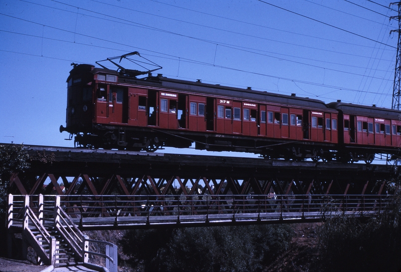 112168: Merri up side Merri Creek Bridge Down Tait Suburban 317 M leading