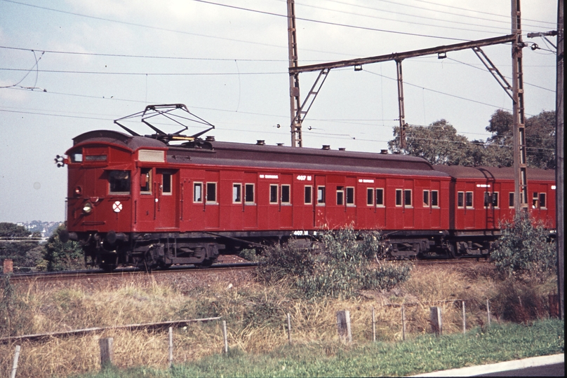 113812: Darebin up side Down Tait Suburban 407 M leading