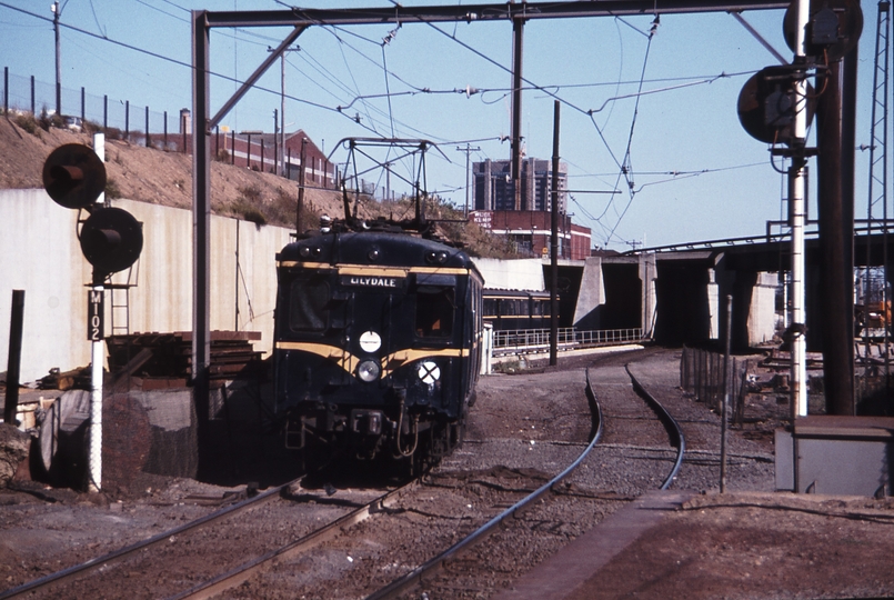 113992: North Melbourne Up Suburban 7-car Harris Showing temporary track stage for MURL