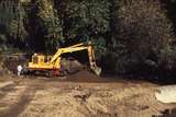 114404: Belgrave Kato Excavator placing filling between Culvert Extension and NBL Shed