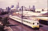 115253: Port Melbourne Up Suburban 4-car Rebuilt Harris 902 M trailing