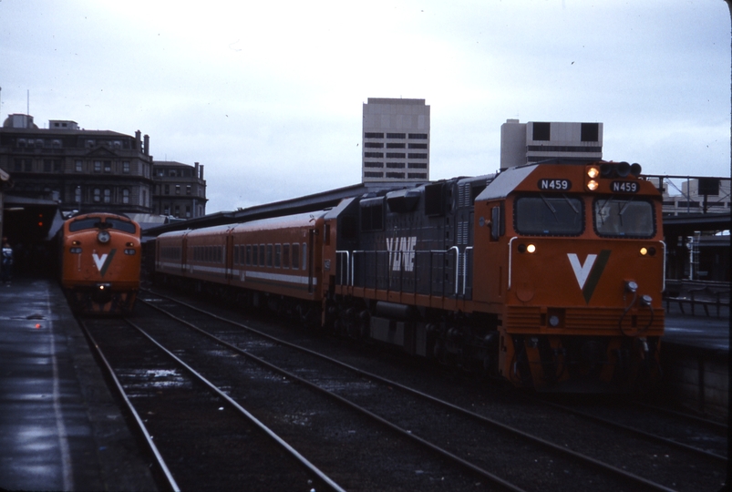 115757: Spencer Street 8221 Down Warrnambool Passenger A 81 leading and 8013 Down Bendigo Passenger N 459