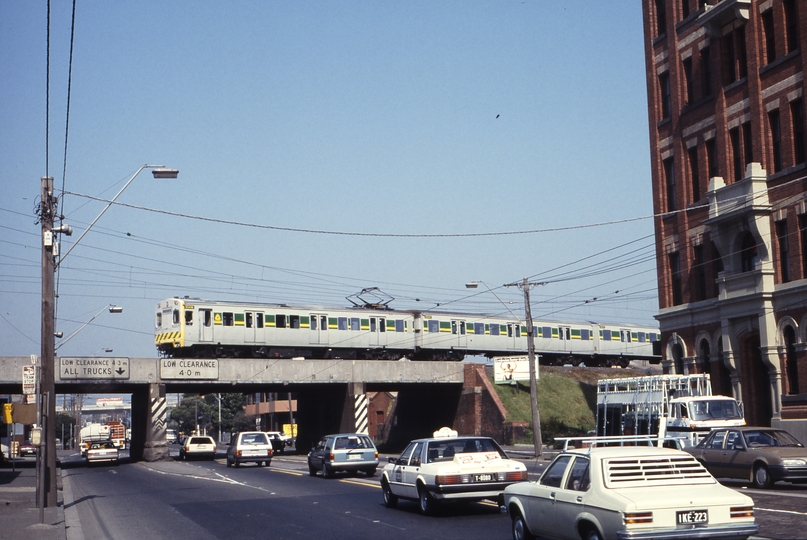 115960: Port Melbourne Line at Clarendon Street Up Suburban 4-car rebuilt Harris 904 M 3504 T leading