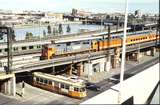 116141: Flinders Street Viaduct at Market Street 8415 Down Sale Passenger N 465 and Northbound Tram Z1 79