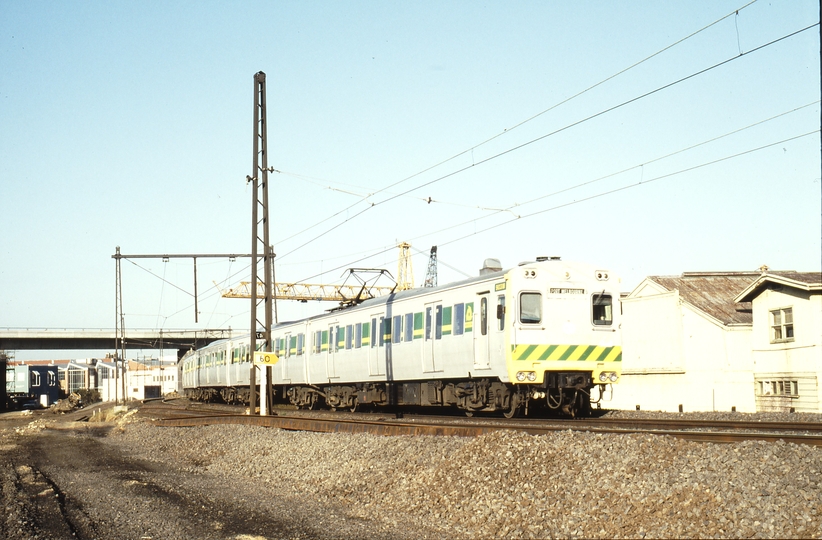 116183: Port Melbourne Line at St Kilda Line Divergence Up Suburban 4-car Rebuilt Harris 903 M leading