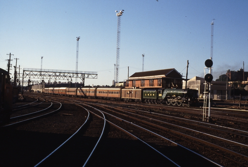 116757: Spencer Street 8697 Down Empty Cars A3 4472 Flying Scotsman trailing