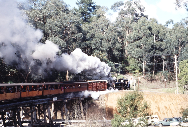 117288: Monbulk Creek trestle Down Passenger 8A 13 NU First vehicle in consist