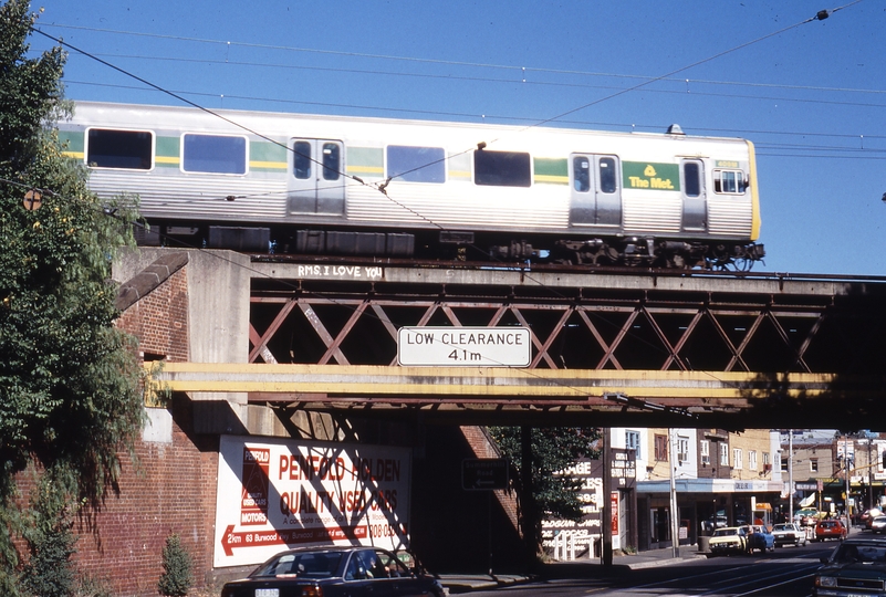 117530: Alamein Line at Toorak Road Down Comeng Suburban 409 M trailing