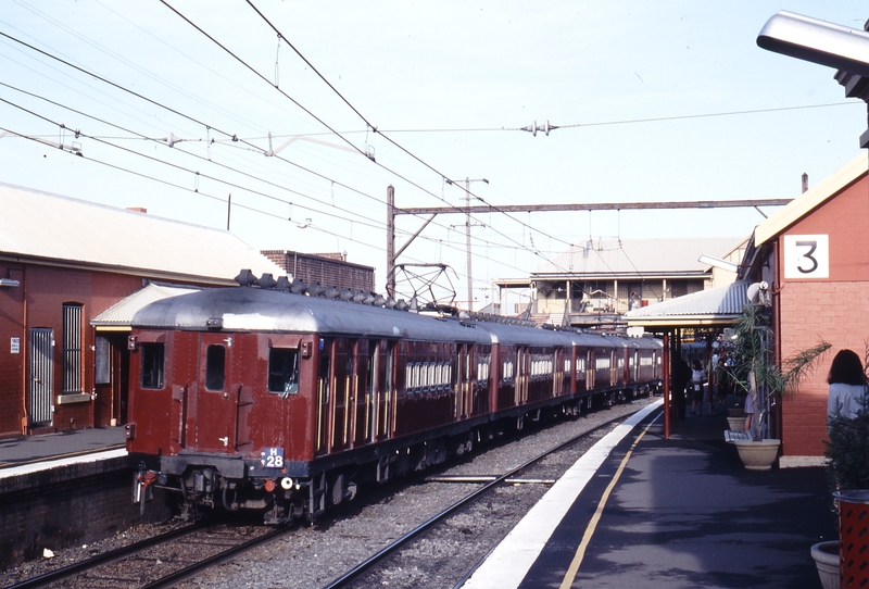 117964: Lidcombe Down Suburban 8-car Single Deck C 7492 trailing