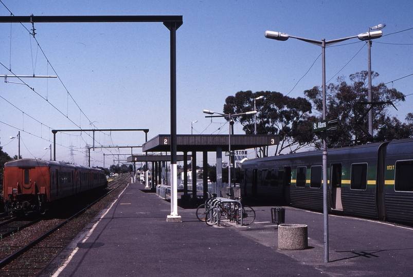 118657: St Albans 8040 Up Passenger From Kyneton P 21 and Up Comeng Suburban 1173 T nearest