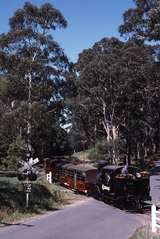 119467: School Road Level Crossing 1 Up Empty Cars Climax 1694