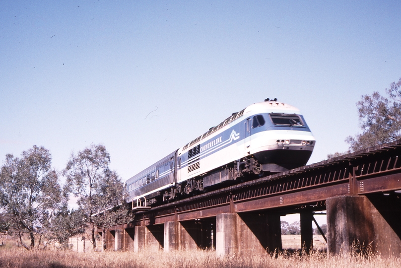 119681: Avenel up side Hughes Creek Bridge 8611 Down Daylight XPT